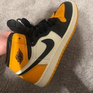 Air Jordan High-Top Sneakers in Black and Orange